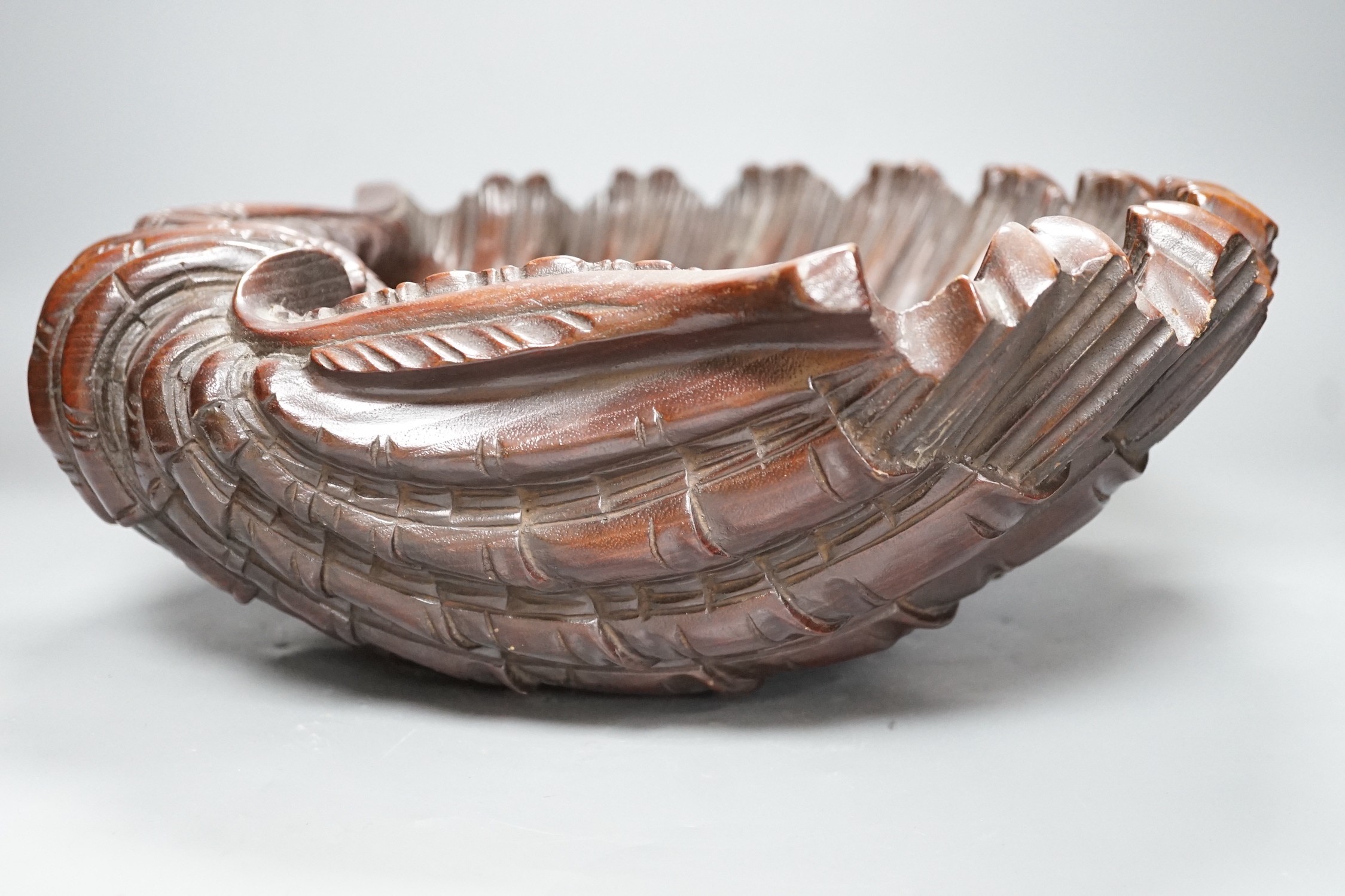 A large 20th century carved walnut scallop shell dish, 41.5cm wide